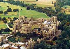 From the air, Windsor Castle sprawls over lush countryside.